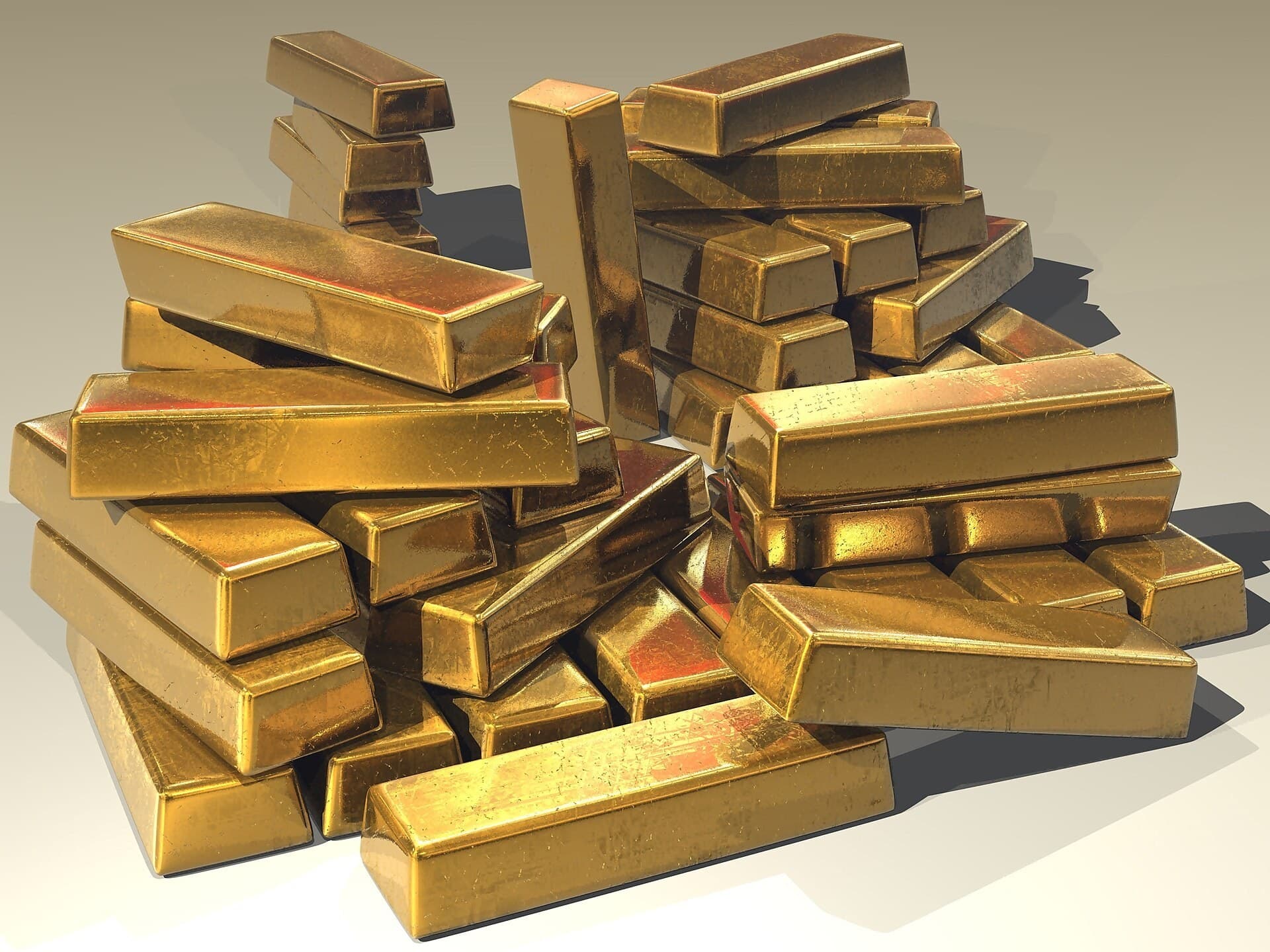 Stacked gold bullion bars.
