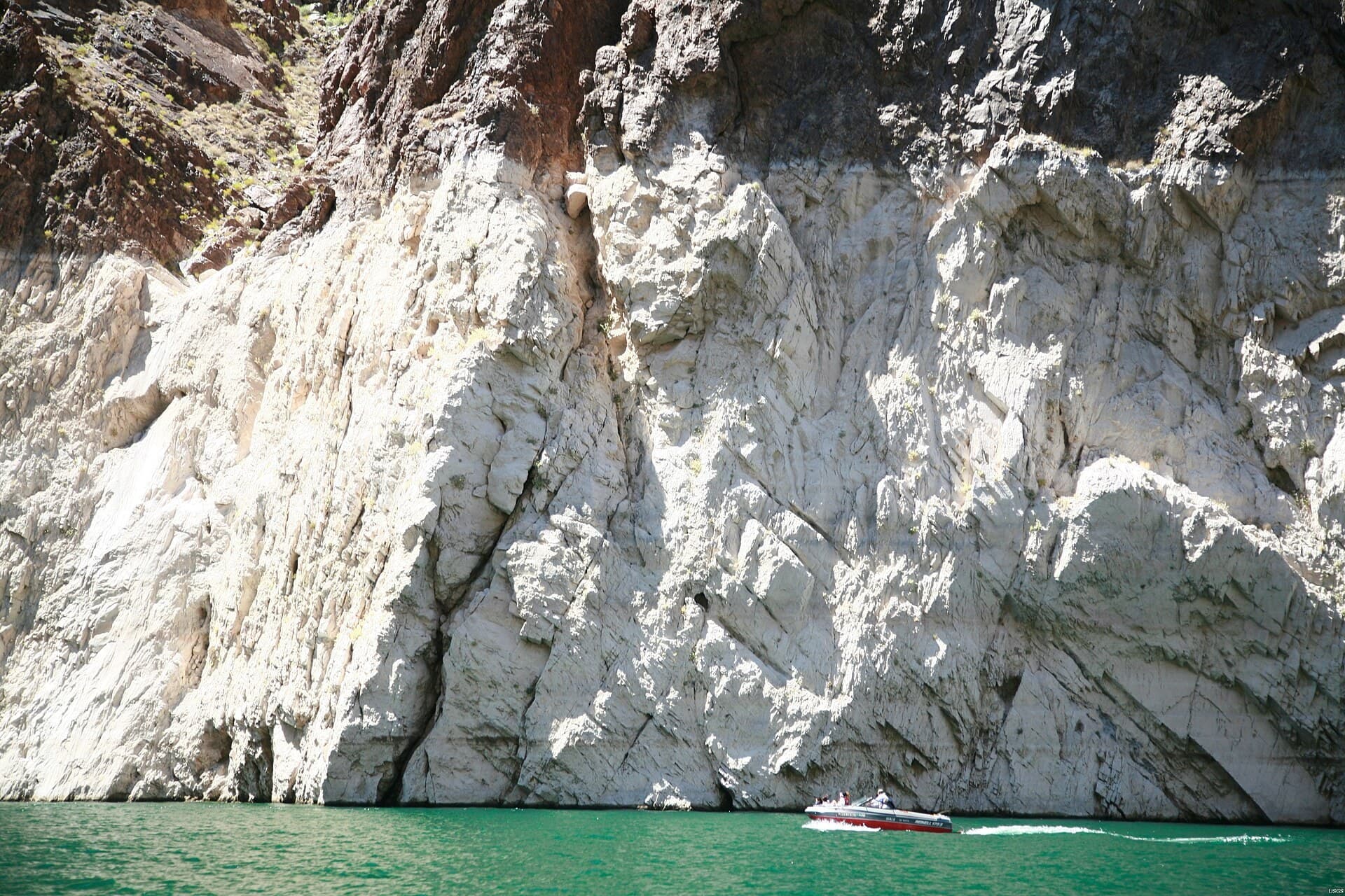 Cracked, dried earth on a drought-stricken lake bed.